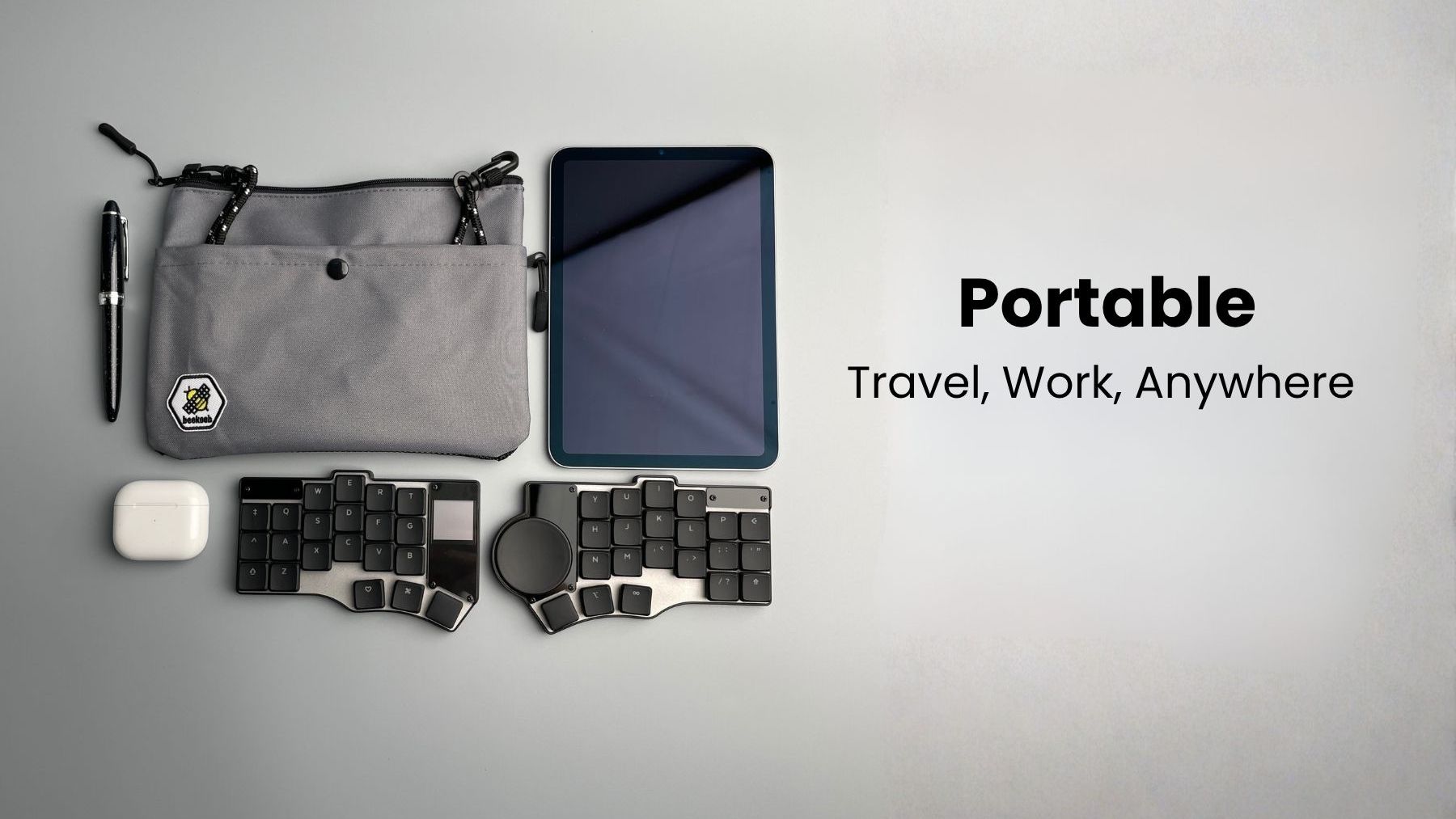 A slim, lightweight, wireless ZMK keyboard with touchpad, a big display and strong aggressive staggered pinky column.